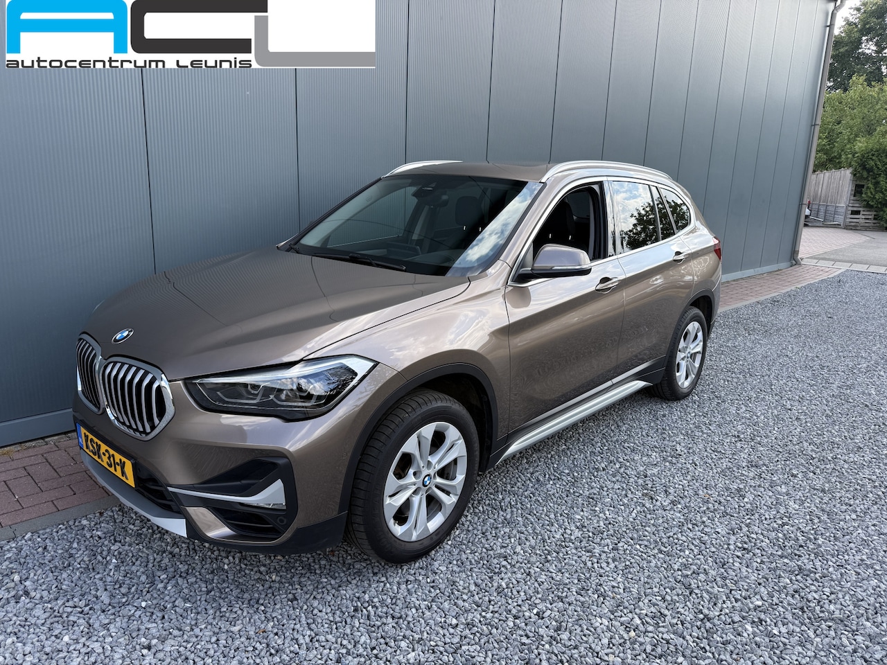 BMW X1 - sDrive20i Automaat High Executive - AutoWereld.nl