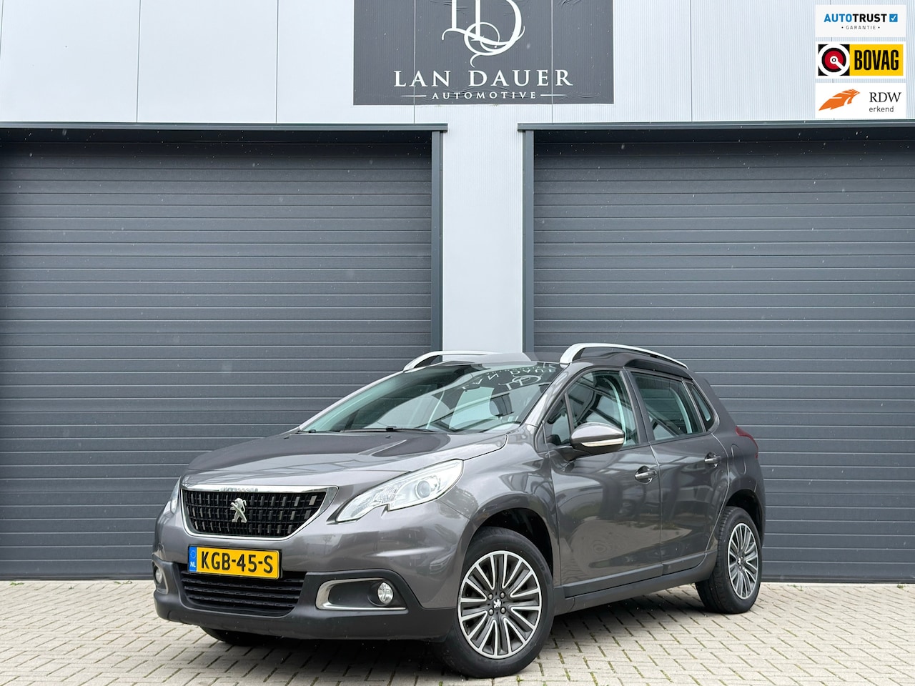 Peugeot 2008 - 1.2 PureTech Allure / AUTOMAAT / APK / NAVI - AutoWereld.nl