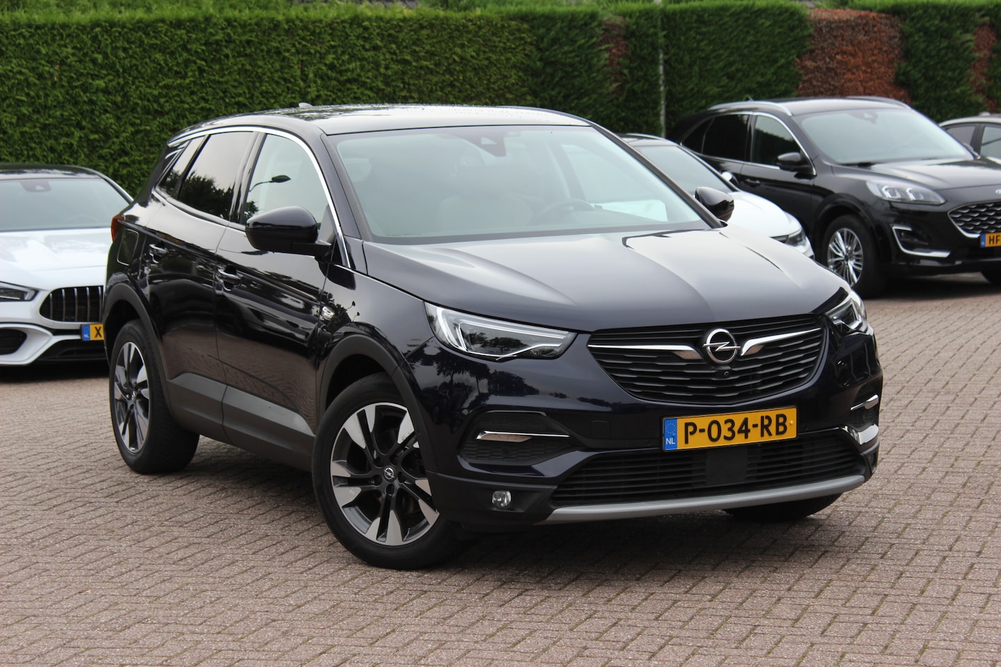 Opel Grandland X - 1.2 Turbo Innovation / Trekhaak / Panoramadak / CarPlay / Keyless / 18'' / Stoelverwarming - AutoWereld.nl