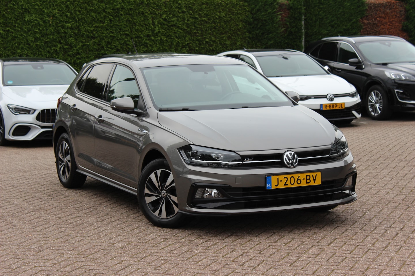 Volkswagen Polo - 1.0 TSI Comfortline R-line / Camera / Navigatie / Parkeerhulp V+A / LED / 16'' / Apple Car - AutoWereld.nl