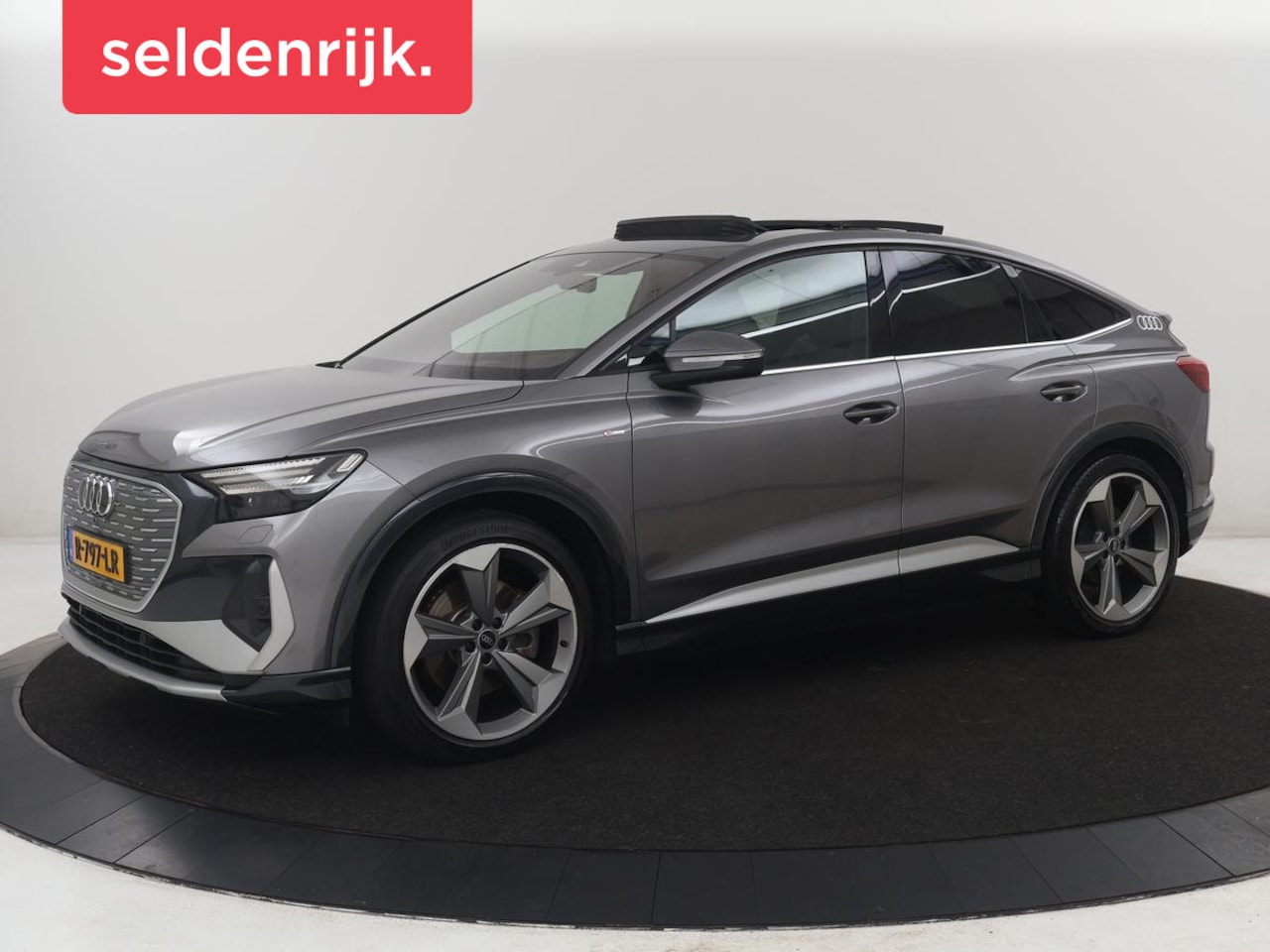 Audi Q4 Sportback e-tron - 40 Launch edition S Competition 77 kWh | SOH 92,5% | Panoramadak | Leder | Stoelverwarming - AutoWereld.nl