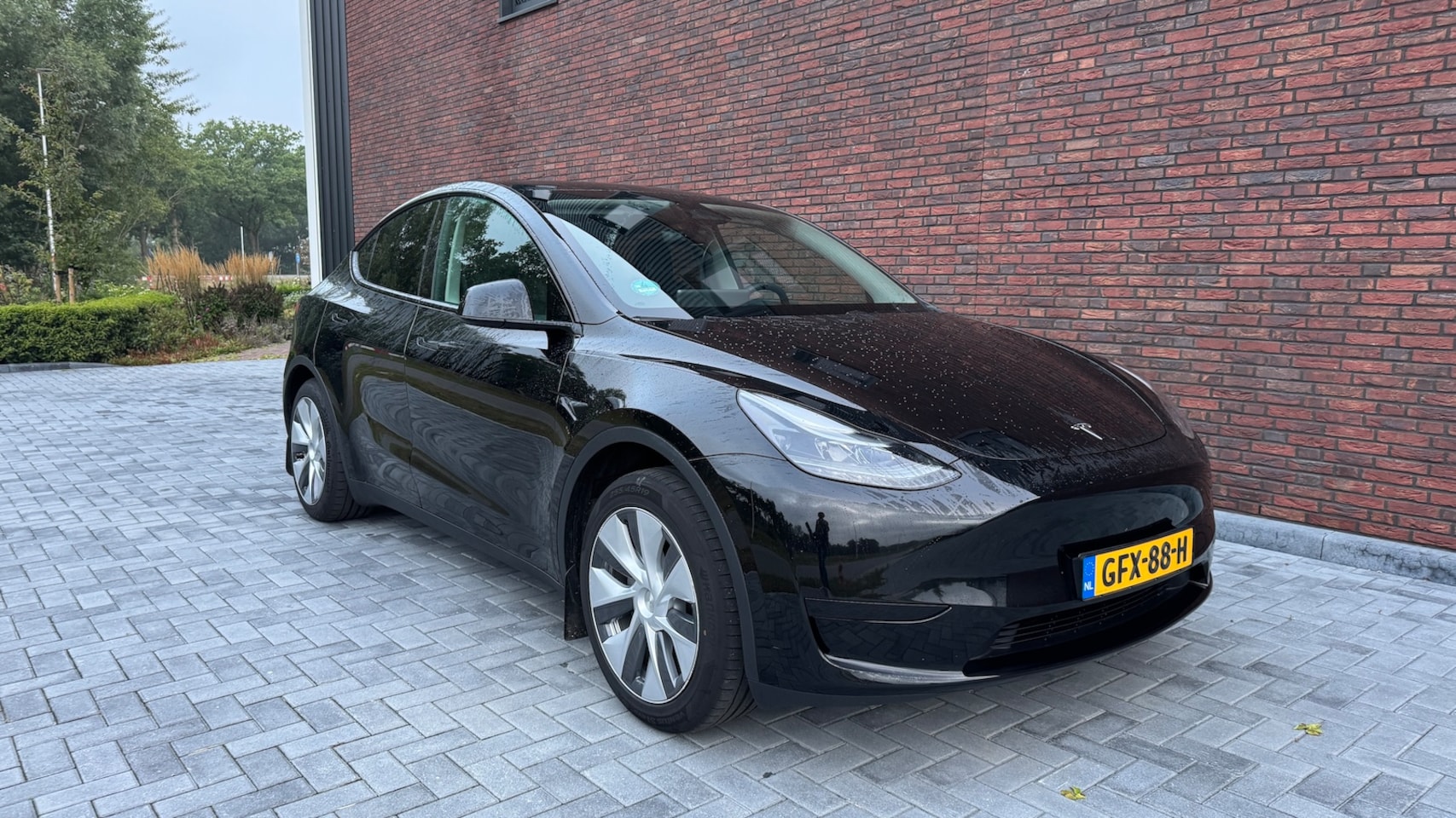 Tesla Model Y - Long Range RWD 75 kWh Tesla Model Y Long Range RWD 75 kWh 2024 TREKHAAK SoH % - AutoWereld.nl