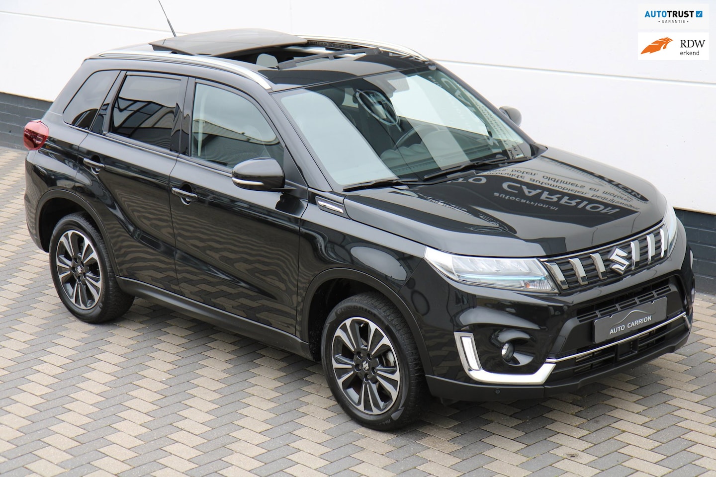 Suzuki Vitara - 1.4 Boosterjet Style Smart Hybrid Pano Carplay !! - AutoWereld.nl