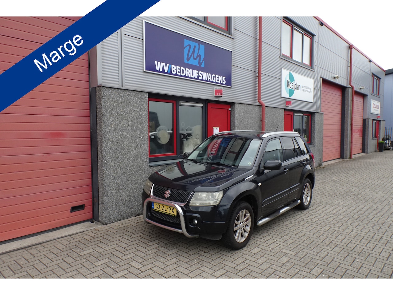 Suzuki Grand Vitara - 2.0-16V Limited leer lmv sidebars - AutoWereld.nl