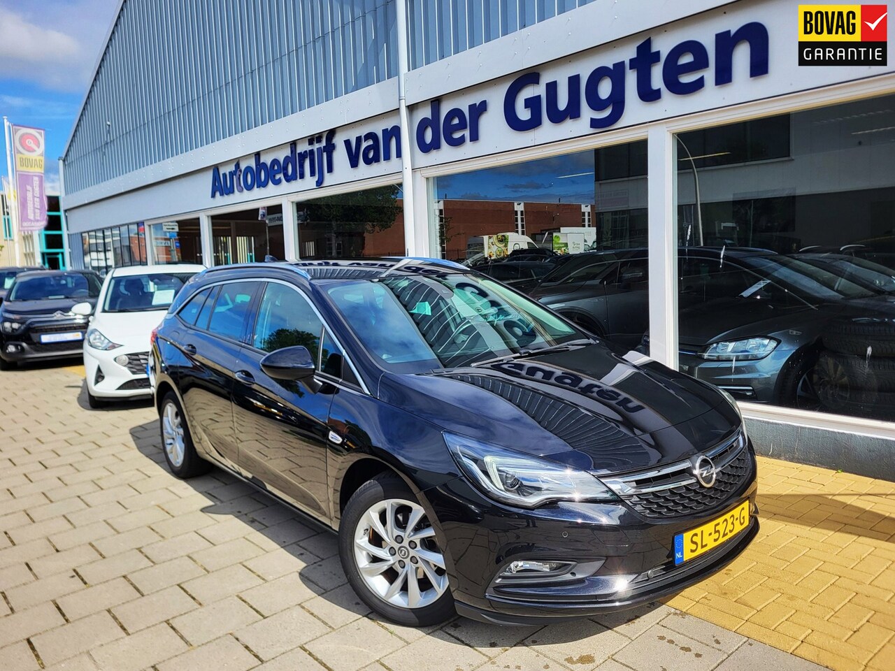 Opel Astra Sports Tourer - 1.0 Innovation / Trekhaak / Airco / Cruise Control / - AutoWereld.nl