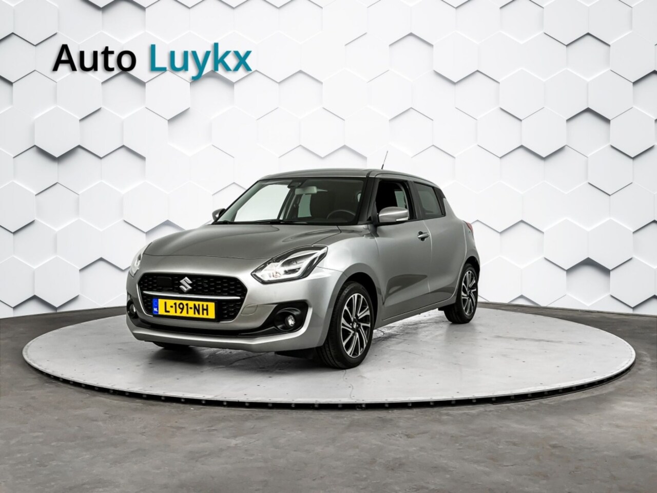 Suzuki Swift - 1.2 Style Smart Hybrid | Navigatie | Adaptieve Cruise Control | Climate Control - AutoWereld.nl
