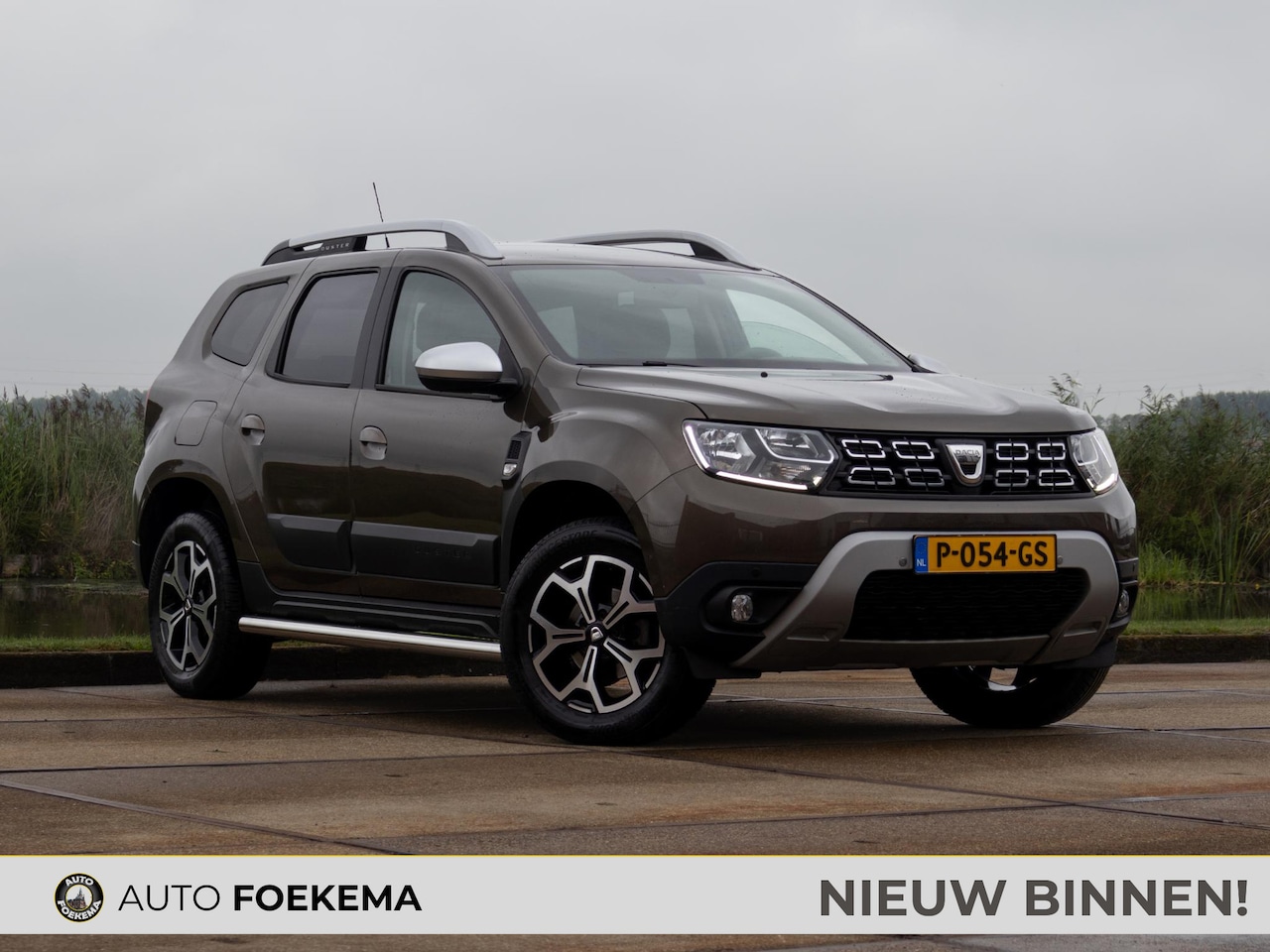 Dacia Duster - 1.0 TCe Bi-Fuel Comfort Camera Sidebars Navi - AutoWereld.nl