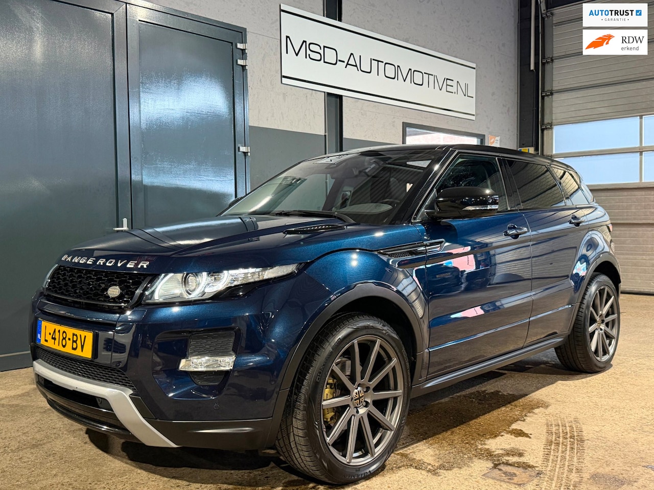 Land Rover Range Rover Evoque - 2.0 Si 4WD Pure Trekhaak Panoramadak - AutoWereld.nl