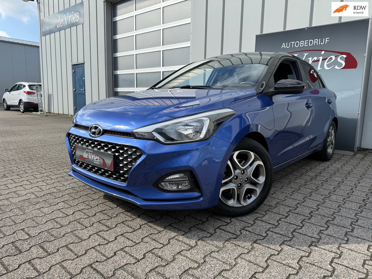Hyundai i20 - 1.0 T-GDI Premium / Airco / Navi / Trekhaak / Stuurverw. / Stoelverw. / Cruise Control / - AutoWereld.nl
