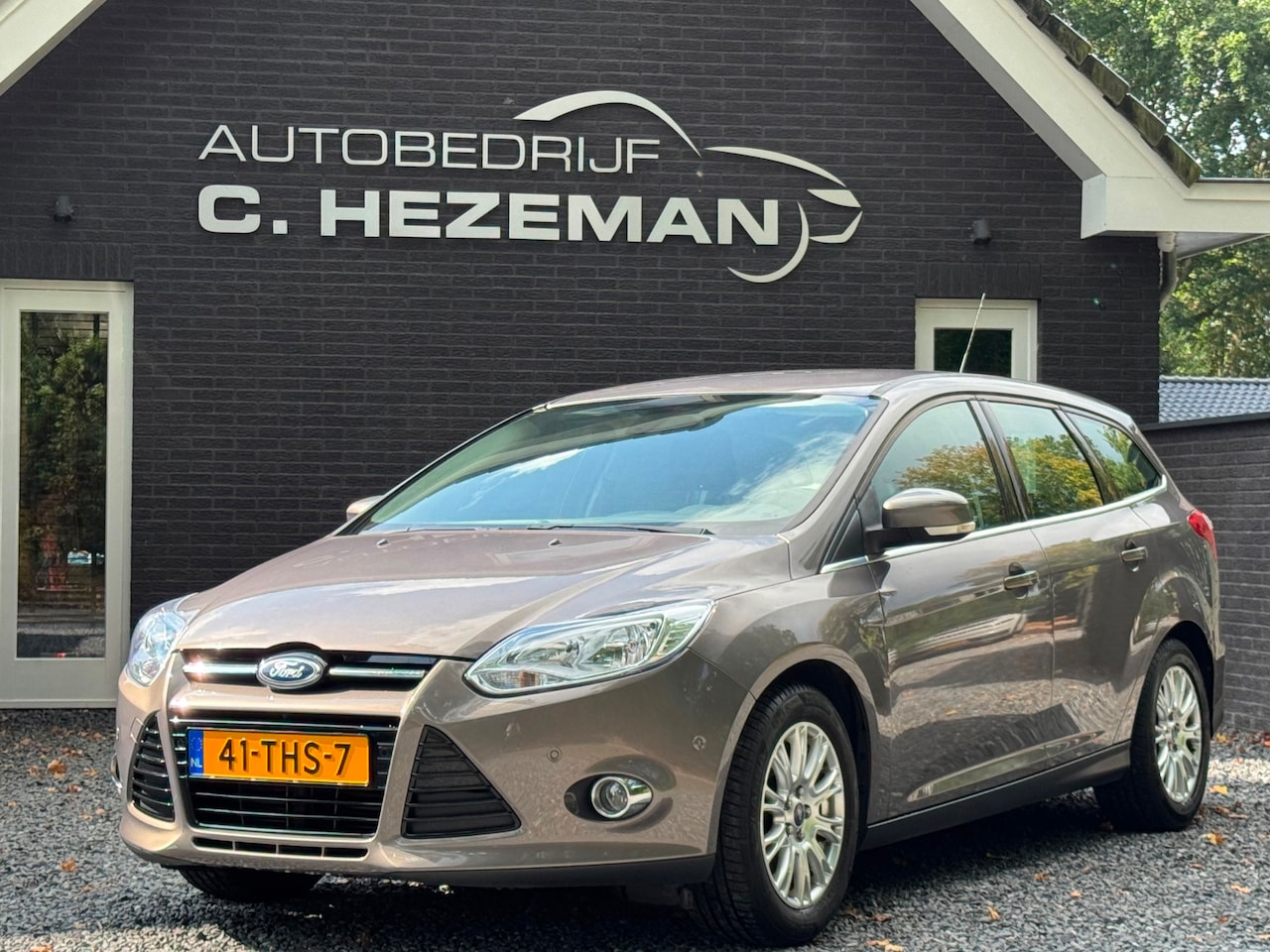 Ford Focus Wagon - 1.6 150pk Titanium Cruise & Climate Control Navigatie PDC V+A Trekhaak - AutoWereld.nl