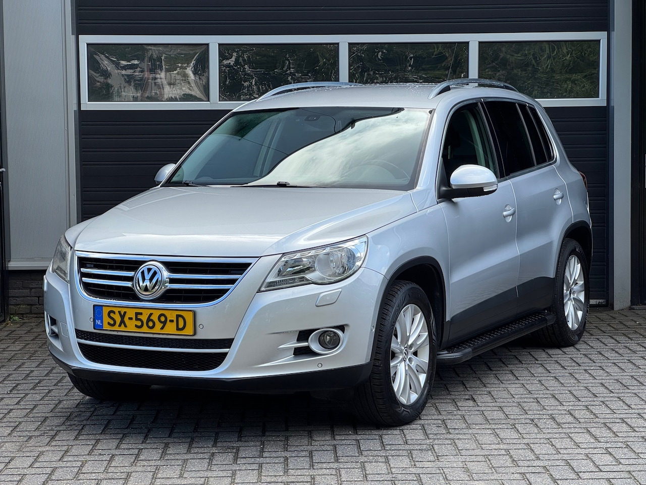 Volkswagen Tiguan - 1.4 TSI Sport&Style Stoelverwarming, PDC, Cruise Control - AutoWereld.nl