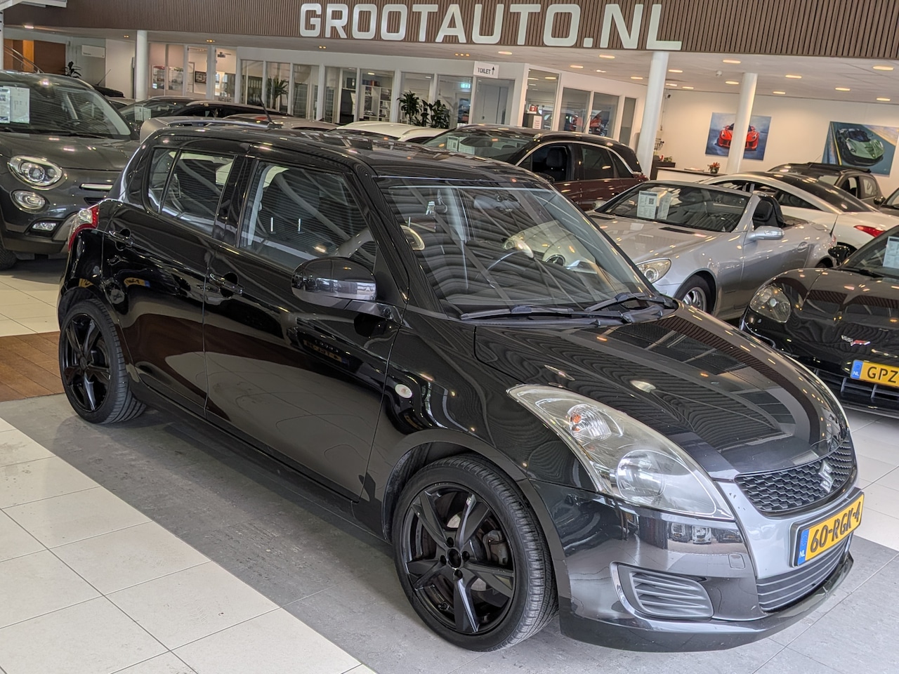 Suzuki Swift - 1.2 Comfort EASSS Airco, Trekhaak, Stuurbekrachtiging - AutoWereld.nl