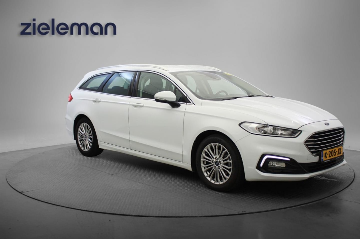 Ford Mondeo Wagon - 2.0 IVCT HEV Titanium - Carplay, Cruise, Clima, Stoelverw. - AutoWereld.nl