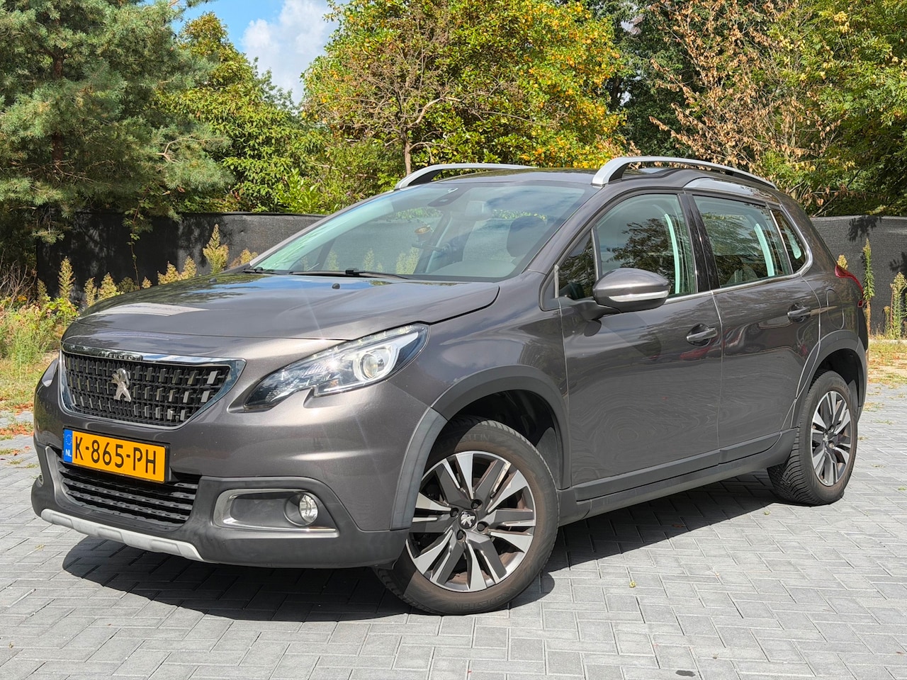 Peugeot 2008 - 1.2 PureTech Allure/Automaat/Clima/Cruise/Navi/PDC/LMV - AutoWereld.nl
