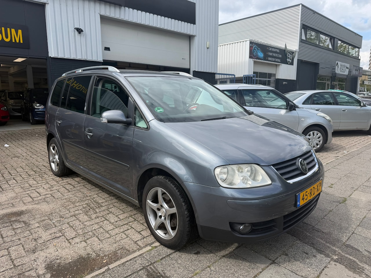 Volkswagen Touran - 1.9 TDI Highline 7 PERSOONS - AutoWereld.nl