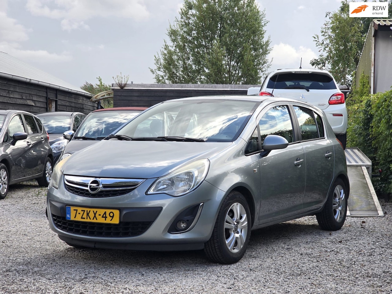 Opel Corsa - 1.2-16V Anniversary Edition 5drs/Airco/Cruise - AutoWereld.nl