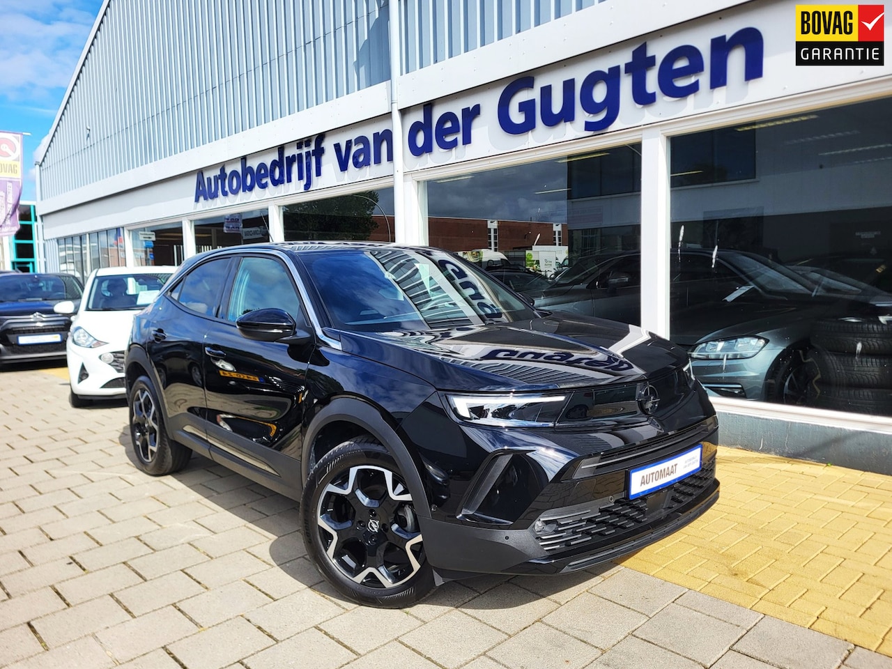 Opel Mokka - 1.2 Turbo Ultimate / Carplay & Android / Camera / 19.000 Km / Stoel -en Stuurverwarming / - AutoWereld.nl