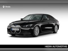 BMW 4-serie Gran Coupé - i4 40 Pure Edition | 17 inch | Getinte Ruiten | Sportstoelen | Schuif/kanteldak | HiFi