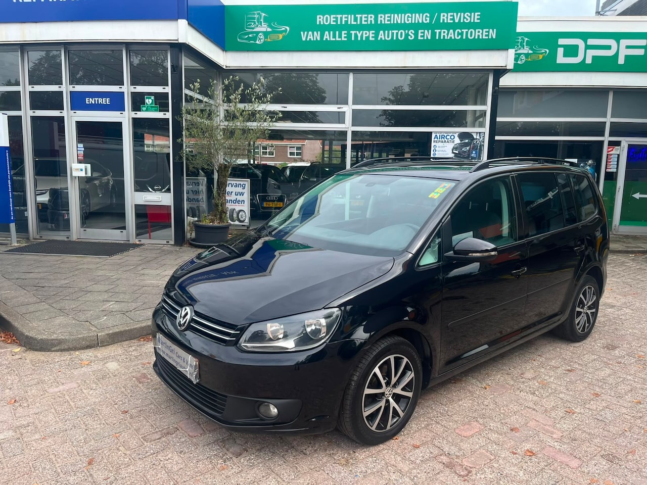 Volkswagen Touran - 1.6 TDI Highline Panorama - AutoWereld.nl