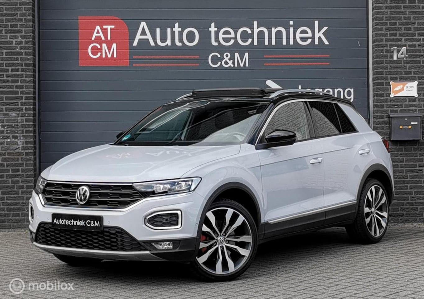 Volkswagen T-Roc - 2.0 TSI 4MOTION SPORT/190PK/DSG/ACC/PANO/DC - AutoWereld.nl