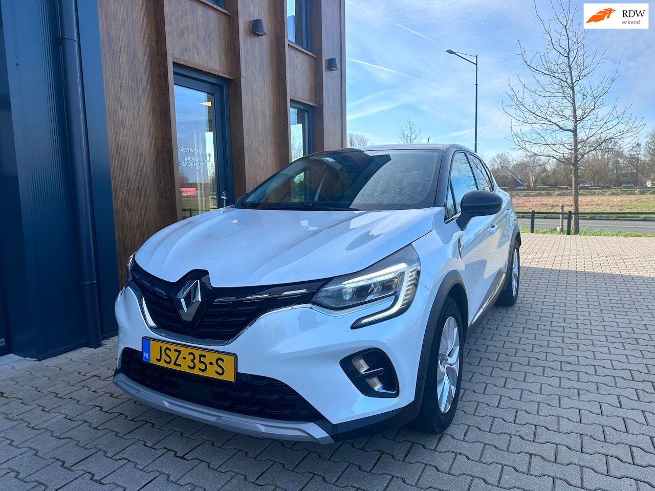 Renault Captur - 1.6 E-Tech Hybrid 145 Intens l camera l parelmoer - AutoWereld.nl