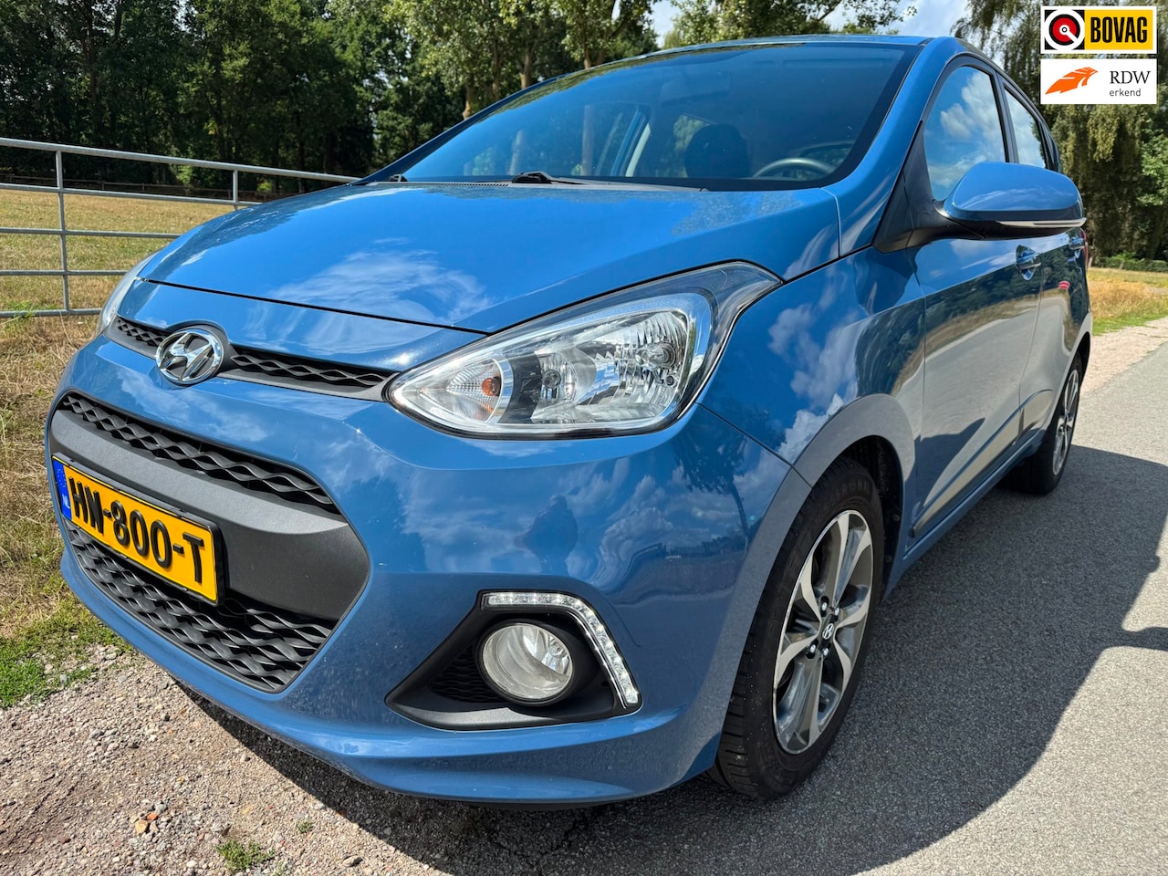 Hyundai i10 - 1.2i top onderhouden|stoel/stuurverwarming|climate control - AutoWereld.nl