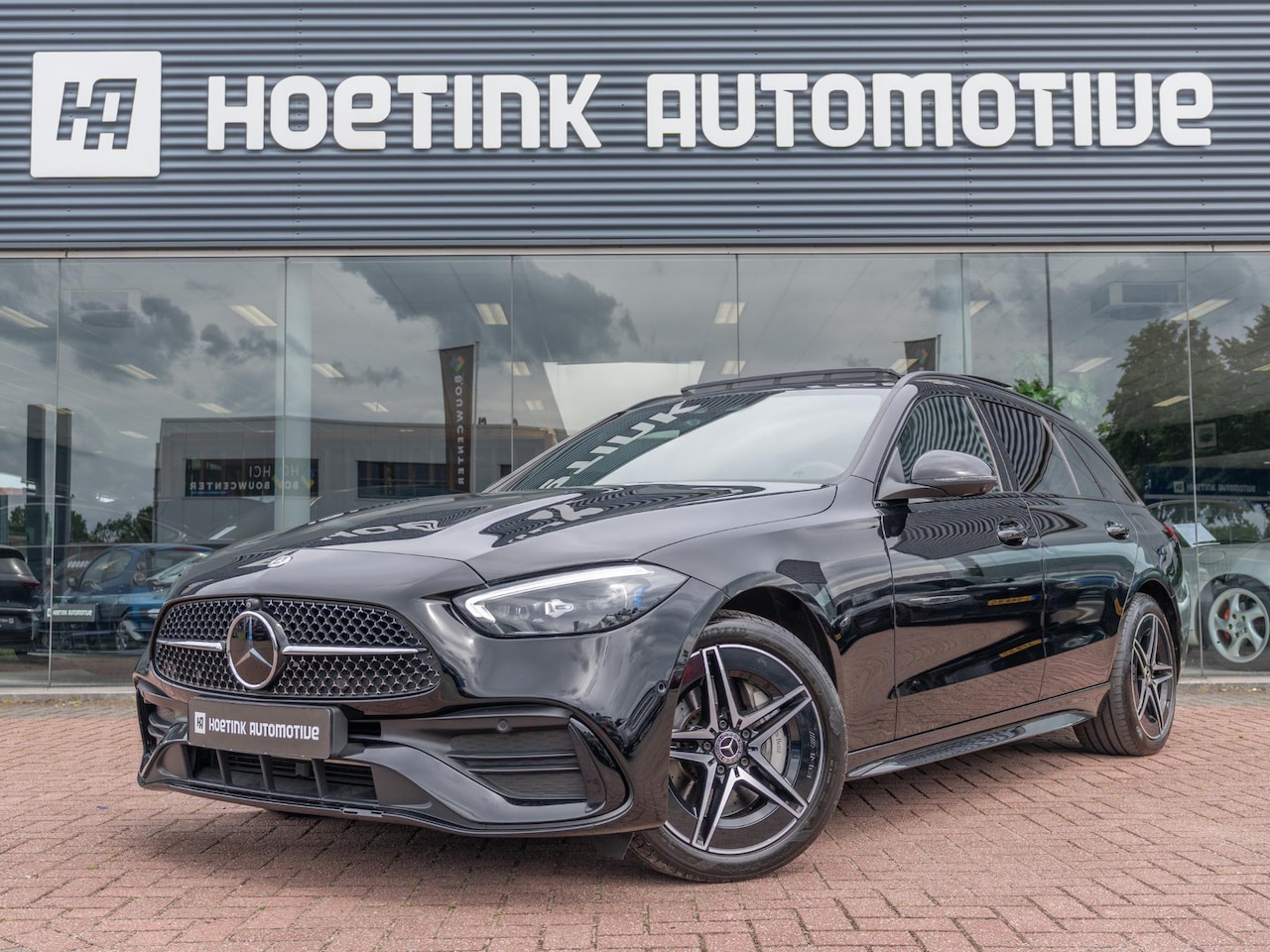 Mercedes-Benz C-klasse Estate - 300 e AMG Line | Massage | Pano | Dealer onderhouden - AutoWereld.nl
