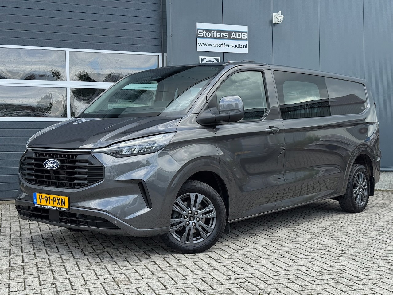 Ford Transit Custom - 320 2.0 TDCI 170pk AWD L2H1 Limited DC Automaat | 6-pers | Trekhaak | Navi | Winterpack | - AutoWereld.nl
