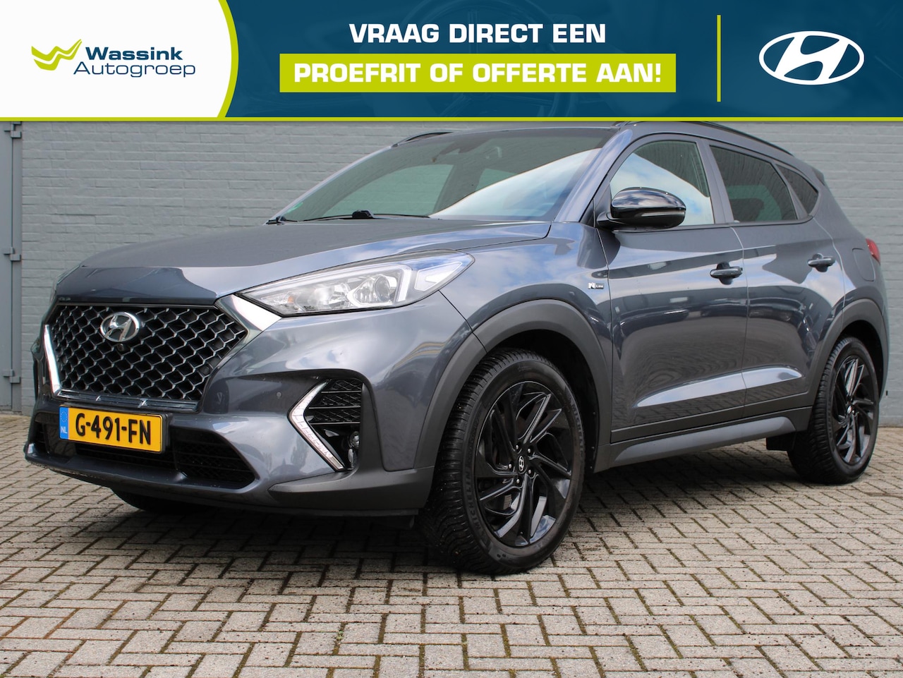 Hyundai Tucson - 1.6 T-GDI N-Line | Kunstlederen/Suede Bekleding | Airco | Lichtmetalen velgen | Stoelverwa - AutoWereld.nl