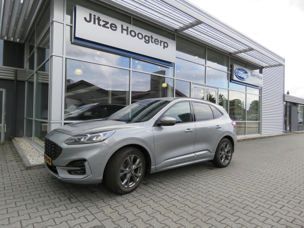 Ford Kuga - 1.5 EcoBoost ST-Line X NAVI,ADAPTIVE CRUISE,TREKHAAK 1800 KG,Head-Up, Keyless, El klep, LE - AutoWereld.nl