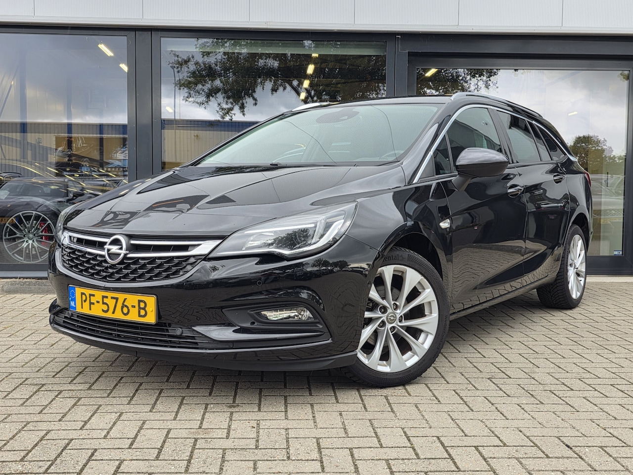 Opel Astra Sports Tourer - 1.4 Innovation + CAMERA + KLIMA + STUUR EN STOELVERWARMING - AutoWereld.nl