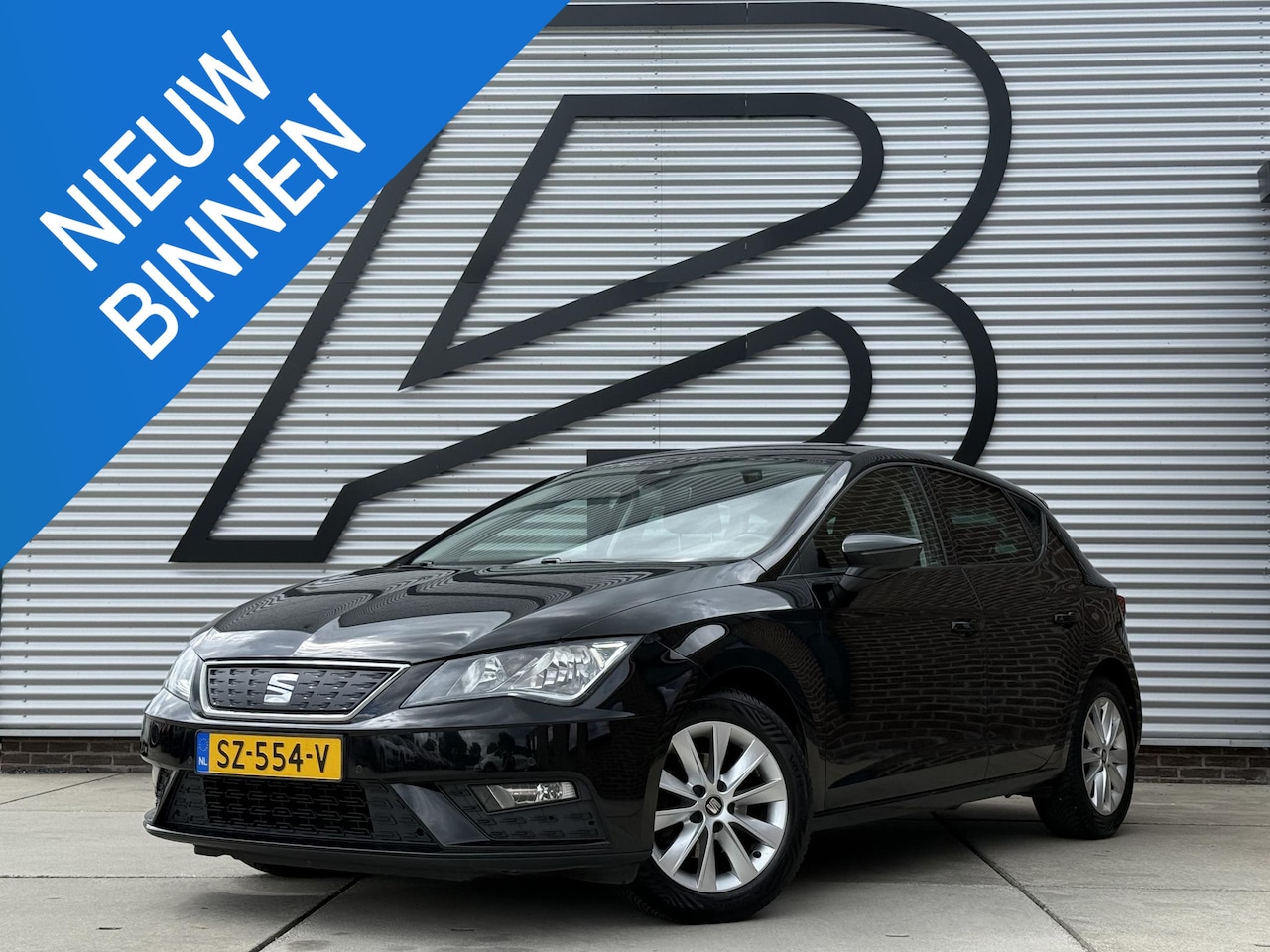 SEAT Leon - 1.0 EcoTSI Style Business Intense Navi|PDC V+A|Clima|Carplay|Cruise|N.A.P|APK tot 02-2027 - AutoWereld.nl