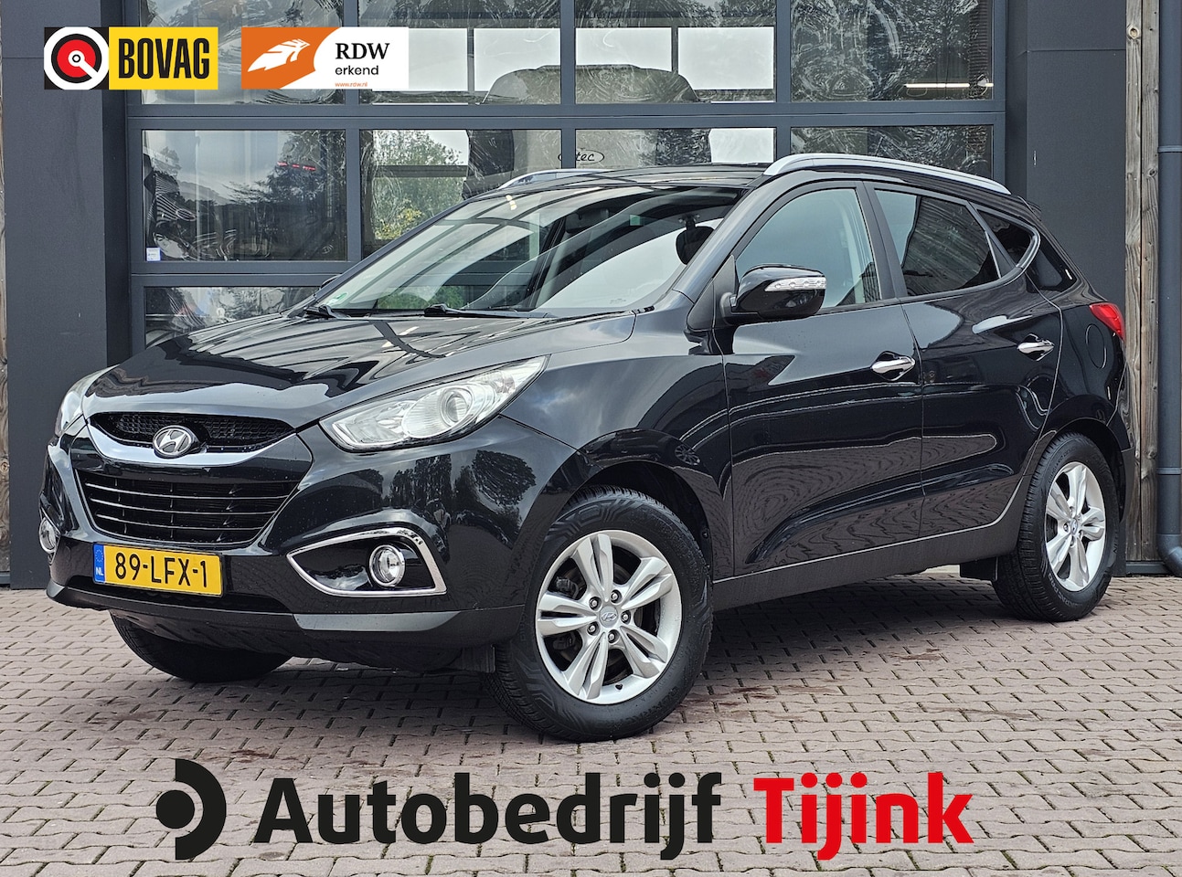 Hyundai ix35 - 2.0i Style | Automaat | Navi | Trekhaak | Cruise | Bluetooth | All-seasons | - AutoWereld.nl