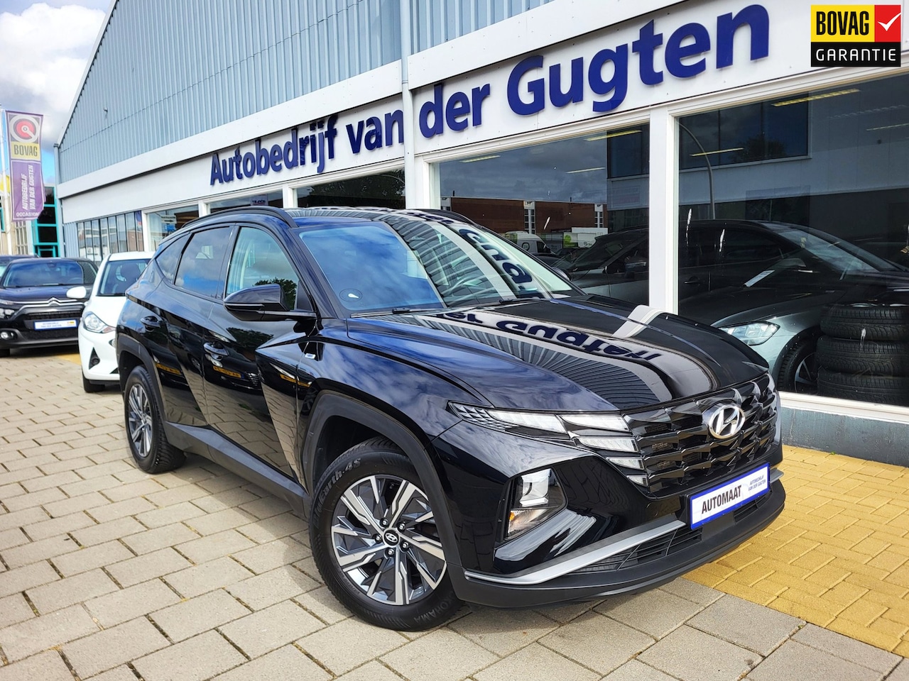 Hyundai Tucson - 1.6 T-GDI MHEV Comfort / Camera / Carplay & Android / Stoel -en Stuurverwarming / - AutoWereld.nl