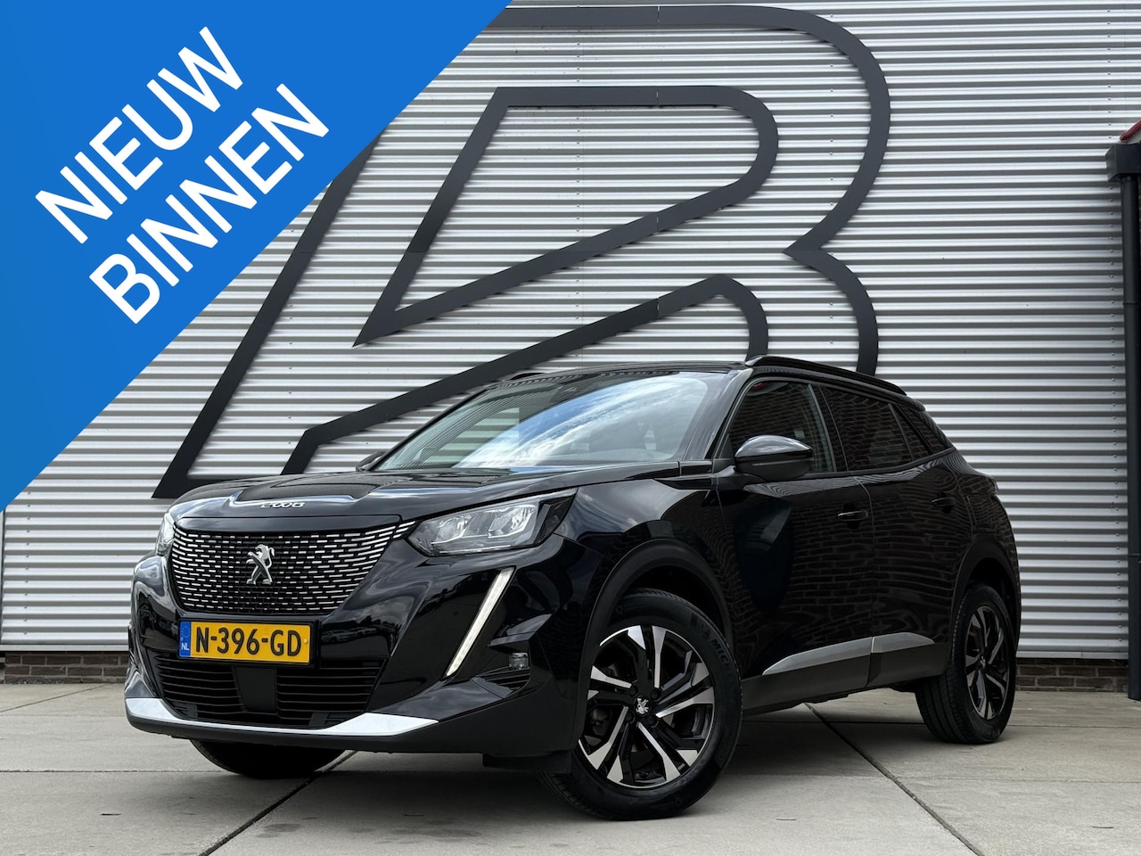 Peugeot 2008 - 1.2 PureTech Blue Lease Allure 1e Eigenaar|Navi|Camera|i-Cockpit|Clima|Cruise|Keyless|Carp - AutoWereld.nl