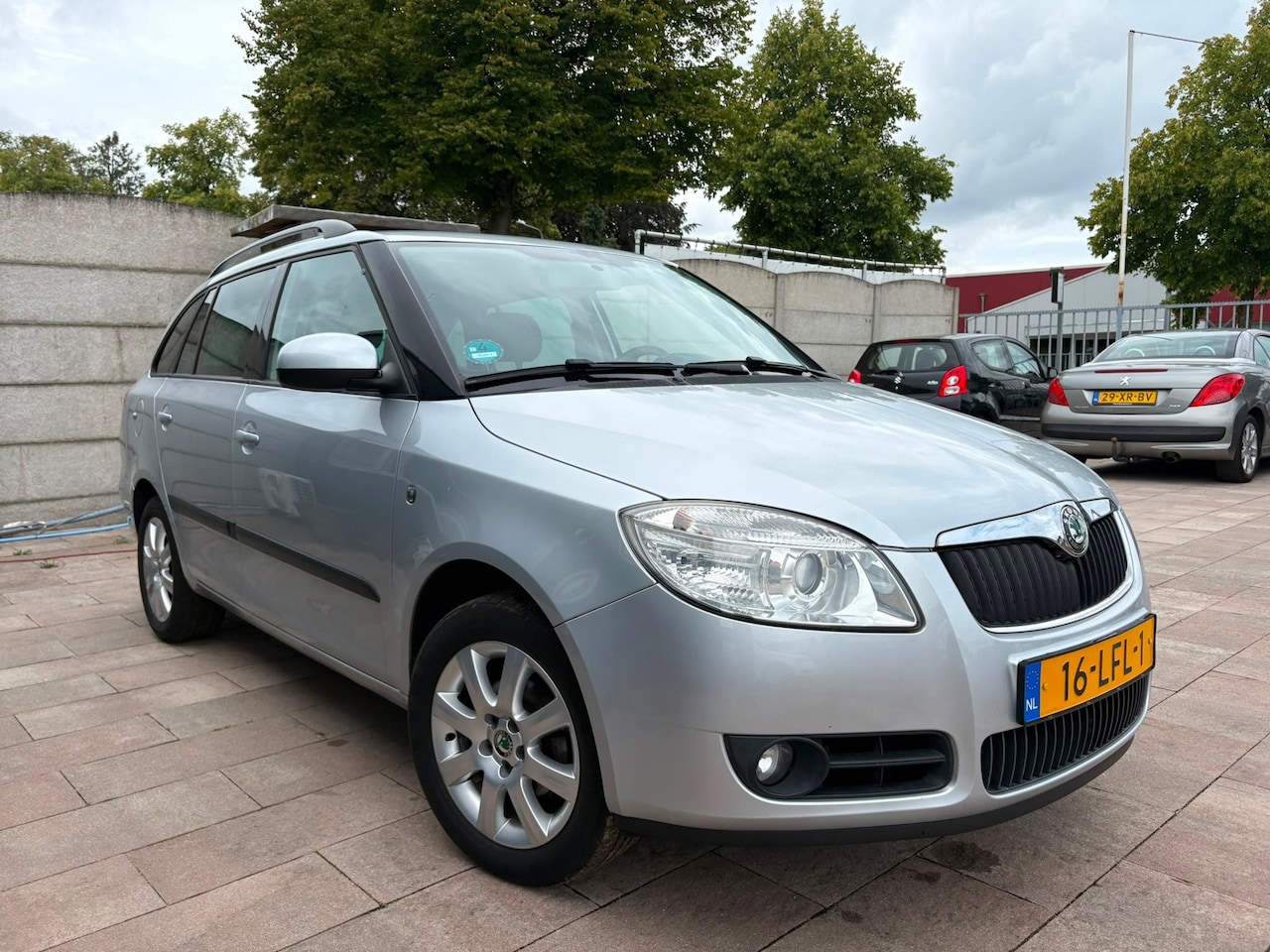 Skoda Fabia Combi - 1.4-16V Sprint|Airco|Cruise|P-sensoren - AutoWereld.nl