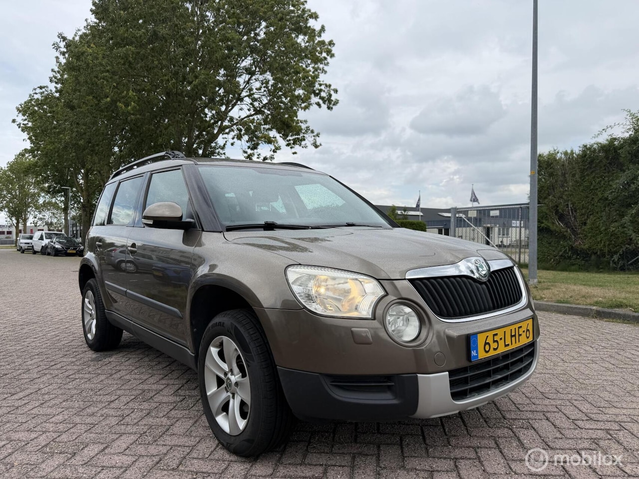 Skoda Yeti - 1.2 TSI Ambition Eerste Eigenaar! - AutoWereld.nl