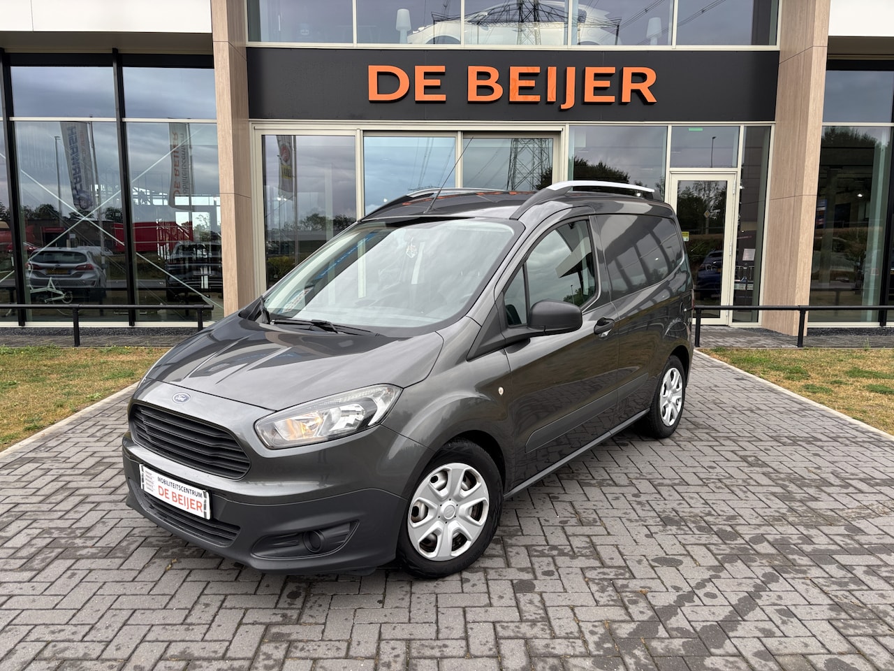 Ford Transit Courier - 1.5 TDCI Economy Edition Airco / Bluetooth I schuifdeur - AutoWereld.nl