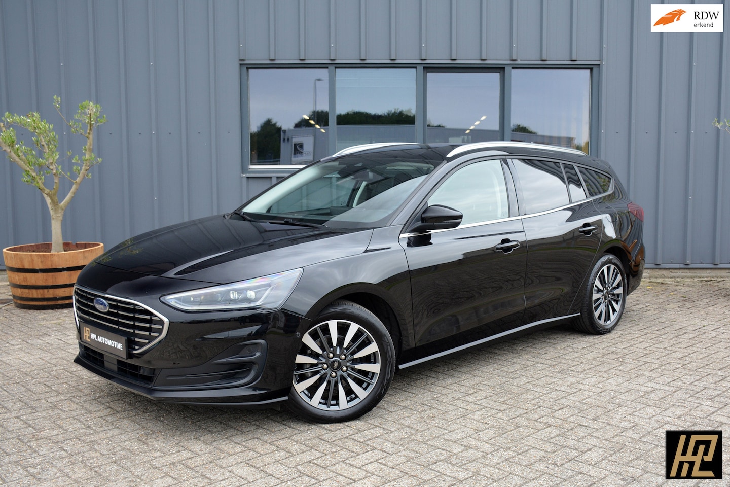 Ford Focus Wagon - 1.0 EcoBoost 155pk Hybrid Titanium X * Zwenktrekhaak * Carplay * Camera * Stuurverwarming - AutoWereld.nl