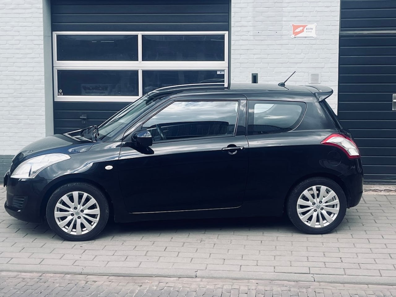 Suzuki Swift - 1.2 Bandit EASSS 1.2 Bandit EASSS - AutoWereld.nl