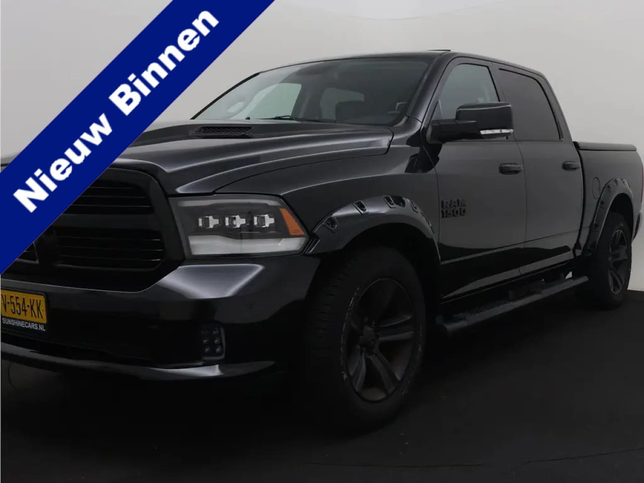 Dodge Ram 1500 - 5.7 V8 4x4 Quad Cab 6'4 Sport 1500 5.7 HEMI V8 4x4 Quad Cab 6'4 Sport | LPG | Schuif/kante - AutoWereld.nl