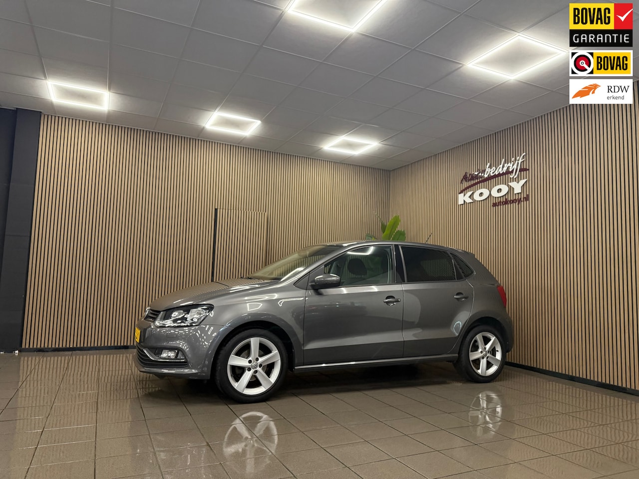 Volkswagen Polo - 1.2 TSI Comfortline * Automaat / 1e Eig / Navigatie / Stoelverwarming * - AutoWereld.nl