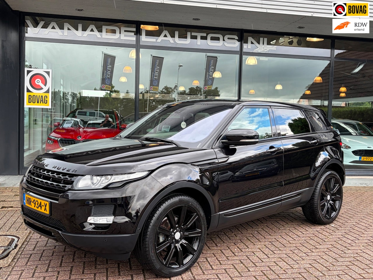 Land Rover Range Rover Evoque - 2.0 Si 4WD Prestige Panorama Leer Navi Camera Trekhaak Zeer Nette Staat! - AutoWereld.nl