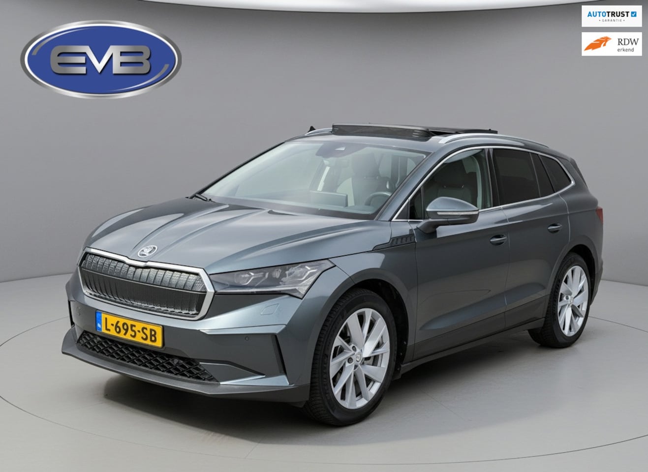 Skoda Enyaq iV - 80 80, panoramadak, electr bedienbare trekhaak, 1/2 lederen sportinterieur, achteruitrijcamer - AutoWereld.nl