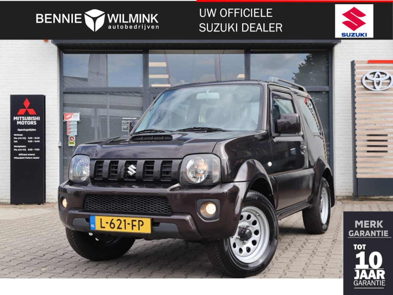 Suzuki Jimny - 1.3 Exclusive Automaat | 4X4 | All Seasons | Airco | Trekhaak - AutoWereld.nl