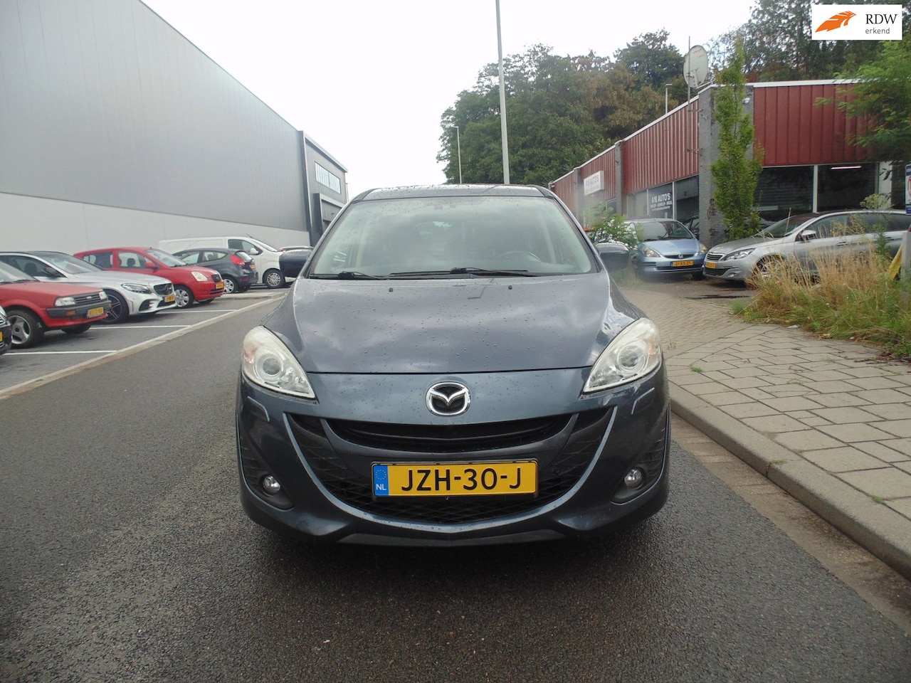 Mazda 5 - 2.0 Business 7 set met N avi airco leder 2011 - AutoWereld.nl