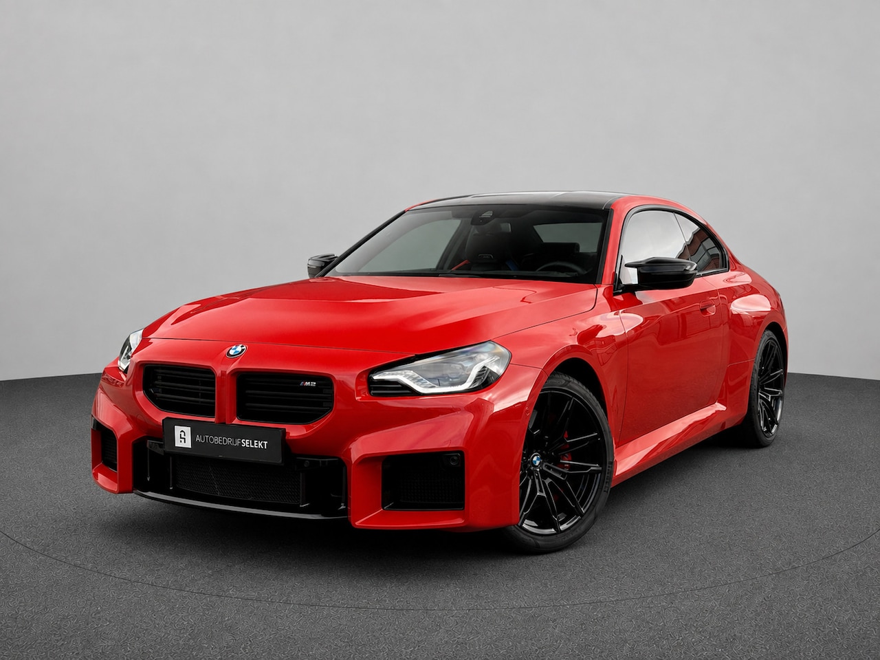 BMW 2-serie Coupé - M2 | G87 | Toronto rood metallic | Carbon dak | Memory - AutoWereld.nl