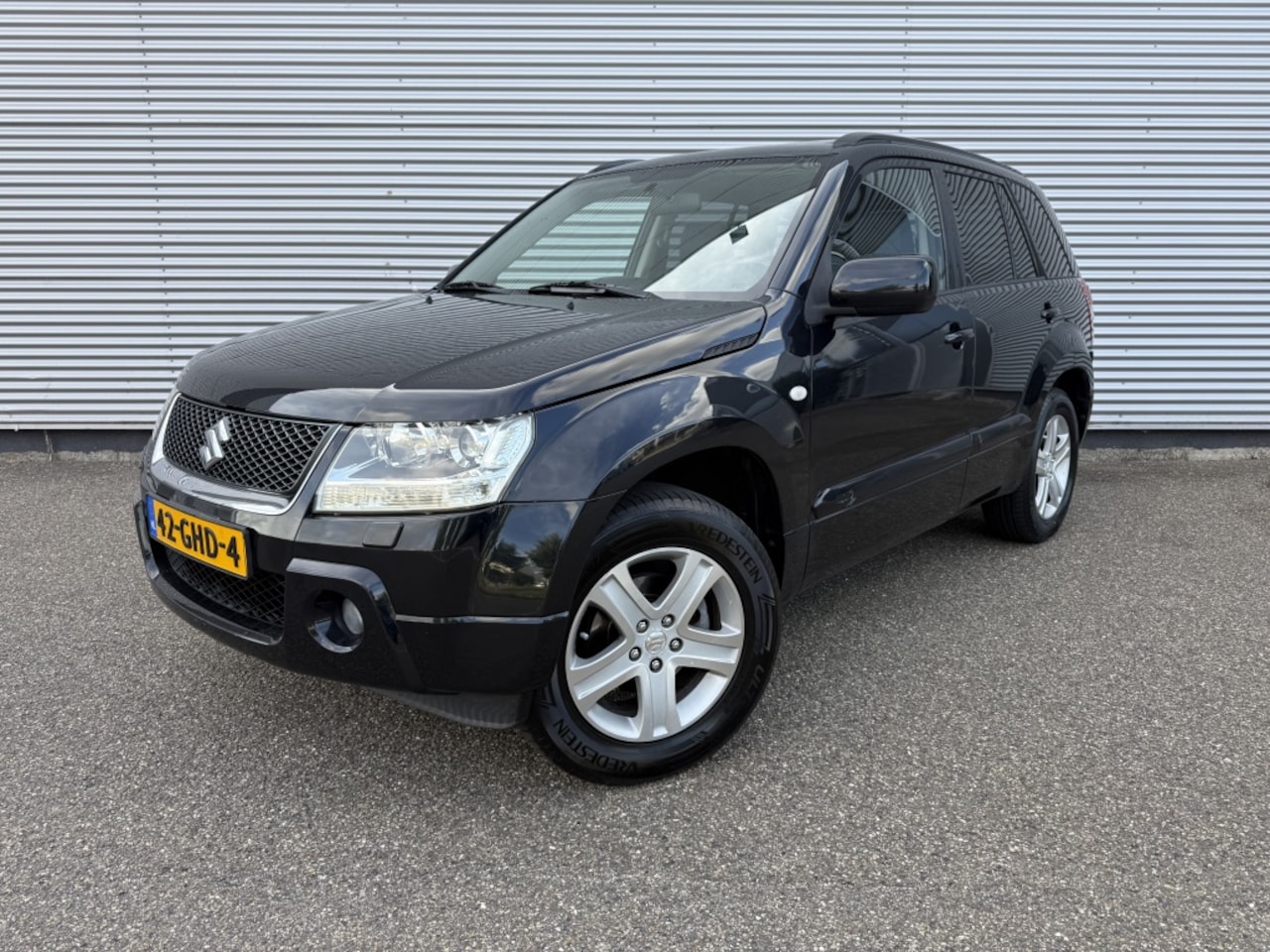 Suzuki Grand Vitara - 2.0-16V High Ex. 4X4 Automaat NAP Trekhaak Keyless Pano Leer - AutoWereld.nl