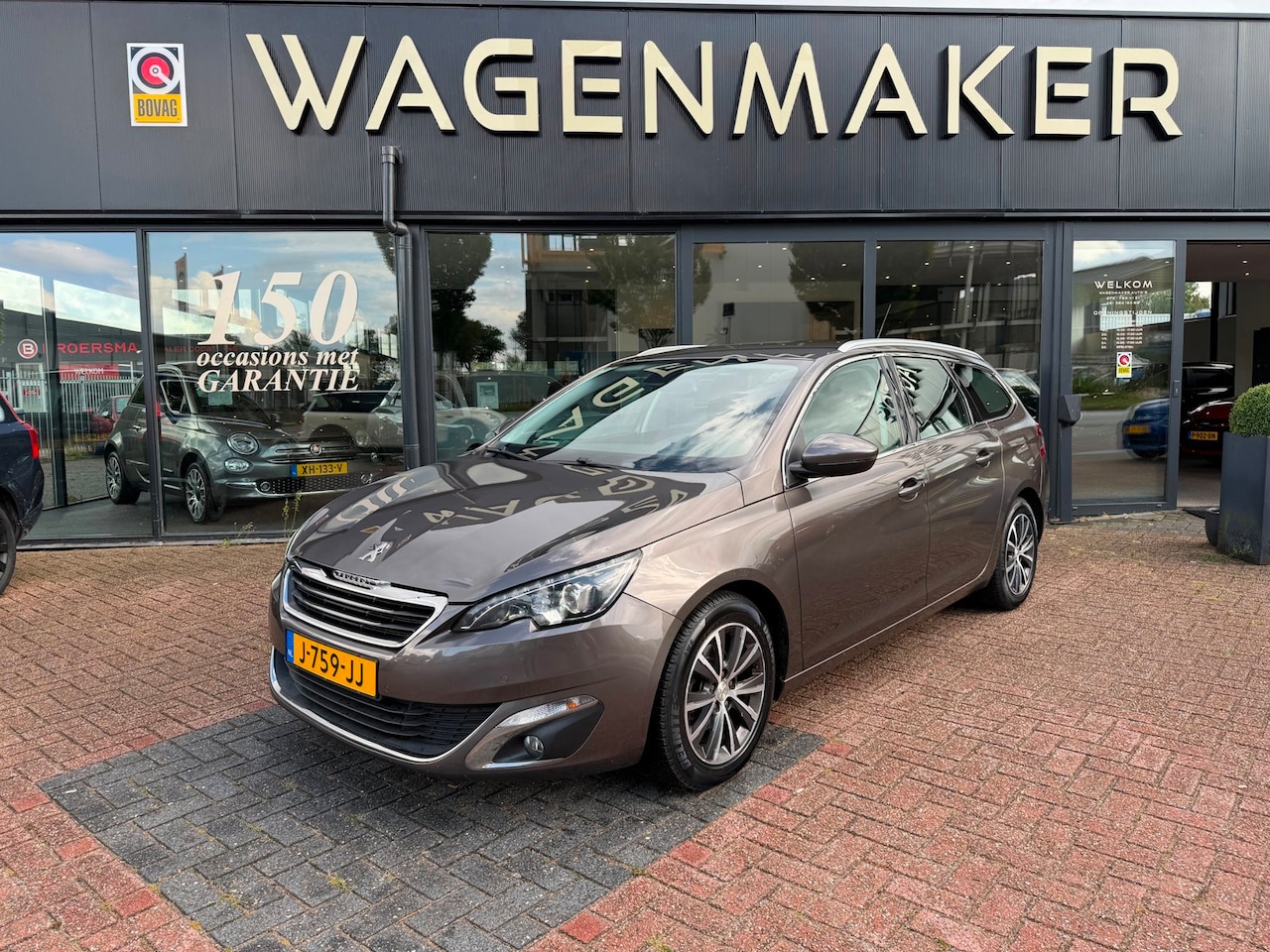 Peugeot 308 SW - 1.2 PureTech Blue Lease Premium NAVI|Cruise - AutoWereld.nl