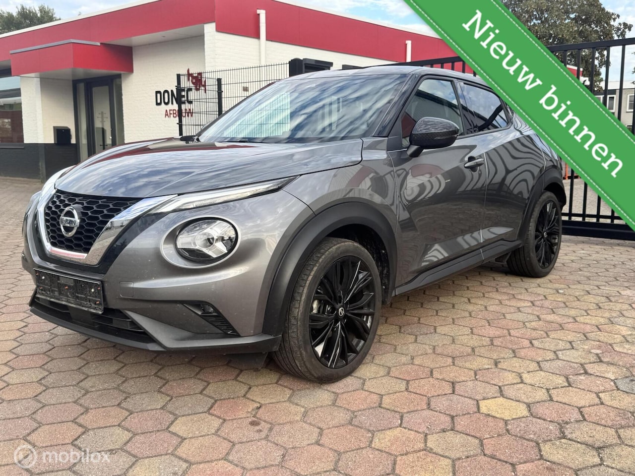 Nissan Juke - 1.0 DIG-T Enigma Automaat NAVI CAMERA CLIMA 19'' - AutoWereld.nl